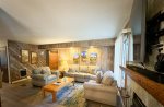 Mammoth Lakes Condo Rental Sunshine Village 157 -  Living Room has a Woodstove